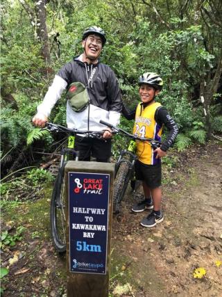 Henare and Taurua on bikes