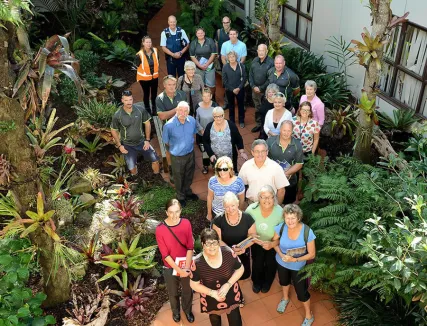 Members of the Eastern Bay of Plenty Bromeliad and Orchid Club join Council staff and representatives of Pride Whakatāne to celebrate the rejuvenation of the Civic Centre atrium garden. Members of the Eastern Bay of Plenty Bromeliad and Orchid Club join Council staff and representatives of Pride Whakatāne to celebrate the rejuvenation of the Civic Centre atrium garden.