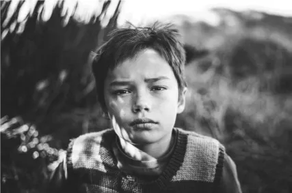 Black and white Photo of young boy