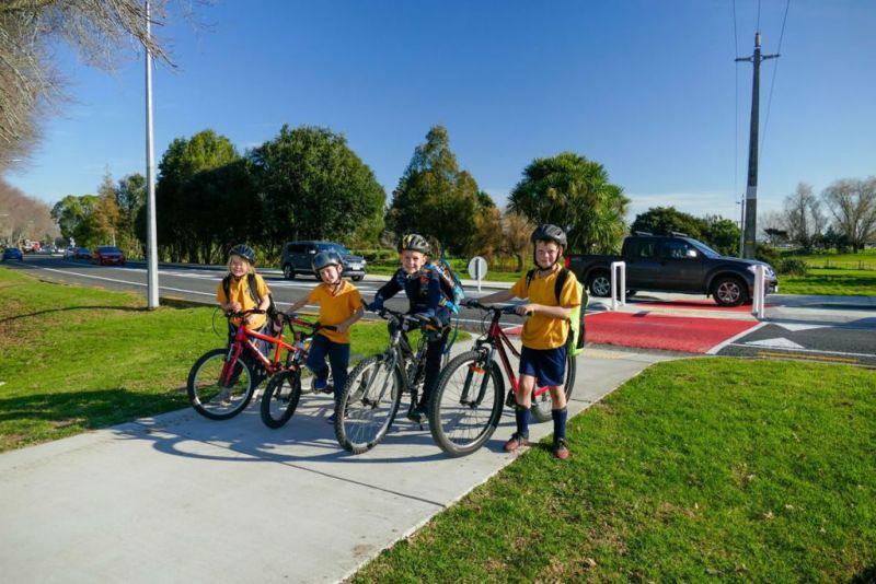 Kids with bikes near Hinemoa Street courtesy crossing