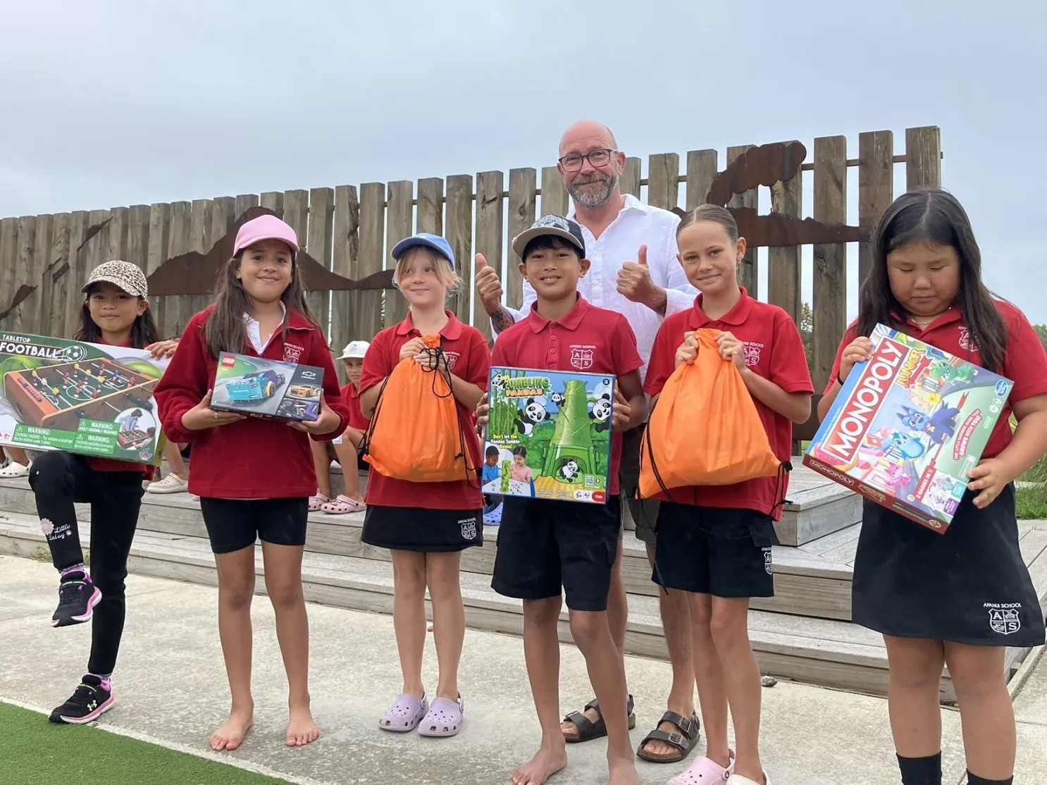 Students who wheeled to school receive prizes from Community Safety Advisor Richard Hamer