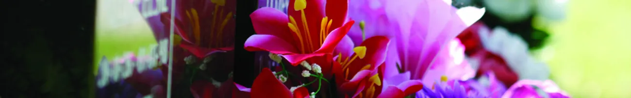 Headstone and flowers baner