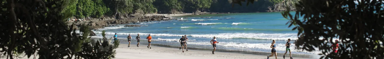 Runners on beach