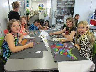 Kids enjoying themselves at the Art Power workshop.