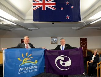 Whakatāne Mayor Tony Bonne , left, and Shibukawa Mayor Sadaji Akutsu exchanged city flags as part of the Friendship Agreement.