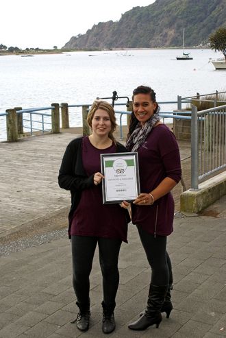 Jaime Clark and Selina Te Kata of the Visitor Centre with the TripAdvisor award.