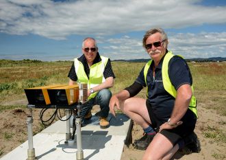 Airways‘ Andrew Young (left) and Charlie Armstrong of CAA Electrical pictured installing the new runway lighting system at Whakatāne Airport.