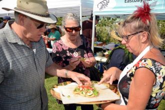 Attendees sample a dish at the inaugural Local Wild Food Challenge.